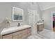 Bright bathroom featuring double sink vanity with decorative mirrors and a luxurious walk-in shower at 104 Leighton Ct, Summerville, SC 29485