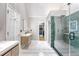 Modern bathroom with a glass enclosed shower, floating vanity, and marble floors at 104 Leighton Ct, Summerville, SC 29485