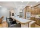 Traditional kitchen with breakfast bar, stainless steel sink, and wood cabinets at 104 Leighton Ct, Summerville, SC 29485