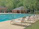 Inviting community pool with plenty of lounge chairs for residents at 104 Leighton Ct, Summerville, SC 29485