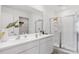 Bright bathroom featuring double sinks, modern fixtures, and glass enclosed shower at 1040 Forrest Creek Dr, Summerville, SC 29483