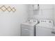 Laundry room with white washer and dryer, and wire shelf for storage at 1040 Forrest Creek Dr, Summerville, SC 29483