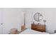 Well-lit bedroom featuring neutral colors, a modern dresser with mirror, and a calming aesthetic at 1048 Forrest Creek Dr, Summerville, SC 29483