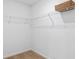 Spacious walk-in closet with ample shelving for organization and storage; perfect for staying organized at 1048 Forrest Creek Dr, Summerville, SC 29483