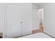 A view from the bedroom showing the hallway and walk-in closet and a standard closet at 1048 Forrest Creek Dr, Summerville, SC 29483