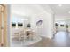 Bright dining room with natural light and modern chandelier at 1051 Tea Time Dr, Summerville, SC 29485
