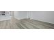 Spacious living room features attractive gray wood-look vinyl flooring at 1052 Forrest Creek Dr, Summerville, SC 29483