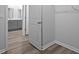 Walk-in closet featuring the bathroom, and neutral gray walls, vinyl flooring at 1052 Forrest Creek Dr, Summerville, SC 29483