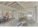 Spacious garage featuring a concrete floor, bike, ladder, and storage area at 1224 Midvale Ave, Charleston, SC 29412