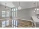 Bright living room with hardwood floors, recessed lighting, and large windows at 1224 Midvale Ave, Charleston, SC 29412