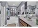 Bathroom with a large tub, sink, and decorative mirrors at 1252 Wild Goose Trl, Summerville, SC 29483