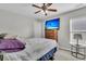 Bedroom featuring a bed with white patterned bedding, a mounted television, and a dresser with window at 1252 Wild Goose Trl, Summerville, SC 29483