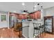 Kitchen area with stainless steel appliances, cabinets, and kitchen island with barstool seating at 1252 Wild Goose Trl, Summerville, SC 29483