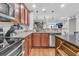 Well-equipped kitchen featuring granite countertops, stainless steel appliances, and a functional island for meal preparation at 1252 Wild Goose Trl, Summerville, SC 29483