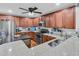 Functional kitchen boasting granite countertops, stainless steel appliances, and a convenient center island for cooking at 1252 Wild Goose Trl, Summerville, SC 29483