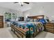 The main bedroom with a large window, wood furniture and a queen-sized bed at 1252 Wild Goose Trl, Summerville, SC 29483
