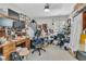 Home office featuring multiple desks and chairs with lots of personal items at 1252 Wild Goose Trl, Summerville, SC 29483