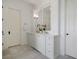 Bathroom featuring a dual sink vanity with white cabinetry and ample storage space at 126 Balfour Dr, Charleston, SC 29492
