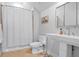 Bathroom with modern sink, white vanity, and a shower with a white shower curtain at 126 Balfour Dr, Charleston, SC 29492