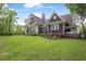 Attractive exterior view highlighting the home's architecture, landscaping, and expansive lawn at 126 Balfour Dr, Charleston, SC 29492