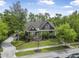 Charming home exterior featuring manicured landscaping, a patterned driveway, and a well-maintained lawn at 126 Balfour Dr, Charleston, SC 29492