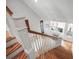 Inviting foyer featuring a hardwood staircase, abundant natural light, and a welcoming atmosphere at 126 Balfour Dr, Charleston, SC 29492