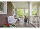 Cozy front porch with a comfortable bench, decorative plants, and a relaxing outdoor ambiance at 126 Balfour Dr, Charleston, SC 29492