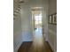 Inviting hallway showcasing hardwood floors and classic architectural details at 126 Balfour Dr, Charleston, SC 29492