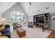 Spacious living room with high ceilings, large windows, comfortable seating, and ample natural light at 126 Balfour Dr, Charleston, SC 29492