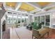 Bright living room featuring a fireplace, large windows, and stylish decor at 126 Balfour Dr, Charleston, SC 29492