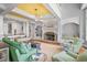 Spacious living room with fireplace, built-ins, and comfortable seating arrangements at 126 Balfour Dr, Charleston, SC 29492