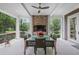 Covered patio with a ceiling fan and outdoor table, great for outdoor dining and relaxation at 126 Balfour Dr, Charleston, SC 29492