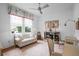 Cozy sitting room with a stylish couch, natural light, and a ceiling fan for comfortable living at 126 Balfour Dr, Charleston, SC 29492