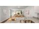 Bright, modern kitchen open to the living area, featuring granite countertops and stainless steel appliances, perfect for entertaining at 132 Haventree Ct, Summerville, SC 29486