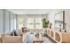 Comfortable living room with a large window, stylish furniture, and natural light, creating a welcoming space for relaxation at 132 Haventree Ct, Summerville, SC 29486
