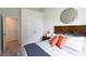 Bedroom with large window, stylish decor, neutral walls, and cozy bedding at 136 Haventree Ct, Summerville, SC 29486