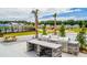 Outdoor community area featuring grilling stations, picnic tables, and a playground at 136 Haventree Ct, Summerville, SC 29486