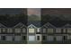Charming new townhomes feature attached garages and inviting architectural details at 136 Haventree Ct, Summerville, SC 29486