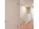 Hallway with neutral carpet and trim, leading to a bedroom at 136 Haventree Ct, Summerville, SC 29486