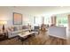 Stylish living room featuring modern decor and light-filled dining area at 136 Haventree Ct, Summerville, SC 29486