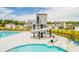 Community pool boasts a spiral water slide, swimming lanes, and relaxing lounge chairs at 138 Haventree Ct, Summerville, SC 29486