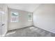 This bedroom has neutral colored walls and two windows at 1421 Dove Run Dr # C, Charleston, SC 29412