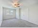 Bright bedroom with neutral carpet and natural light from the window at 1421 Dove Run Dr # C, Charleston, SC 29412