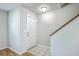 Inviting entryway with tile flooring, stairs and a white front door at 1421 Dove Run Dr # C, Charleston, SC 29412
