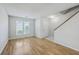 Bright living room with wood floors, window and neutral walls at 1421 Dove Run Dr # C, Charleston, SC 29412
