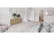 Tranquil bedroom with neutral tones, soft carpet, modern décor, and ample closet space at 177 Morning View Way, Moncks Corner, SC 29461