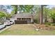 Charming single-story home with brick accents, mature landscaping, and a well-manicured front yard at 181 Commons Way, Goose Creek, SC 29445