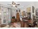 Office space with hardwood floors, bright lighting and decorated with an assortment of paintings at 181 Commons Way, Goose Creek, SC 29445