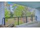 Relaxing balcony view with outdoor seating, offering a peaceful spot to enjoy the surrounding green landscape at 1816 Orangeburg St, North Charleston, SC 29405