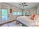 Inviting bedroom boasts natural light, a decorative rug, access to outdoor patio, and neutral tones for relaxation at 1816 Orangeburg St, North Charleston, SC 29405
